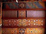Tibet Guge 06 Tsaparang White Temple 10 12 Jowo Khang Ceiling The roof of the temple may also be considered as the richest and most finely worked out in the whole of Western Tibet. � It is made of large wooden planks, brought with great labour from the Himalayan valleys towards India, well smoothed and then painted. Their decoration consists in a series of mandalas, all on the same axis, and of stylized floral and geometric motifs, never repeating themselves. - Giuseppe Tucci: The Temples of Western Tibet and their Artistic Symbolism (1935). Photo � 